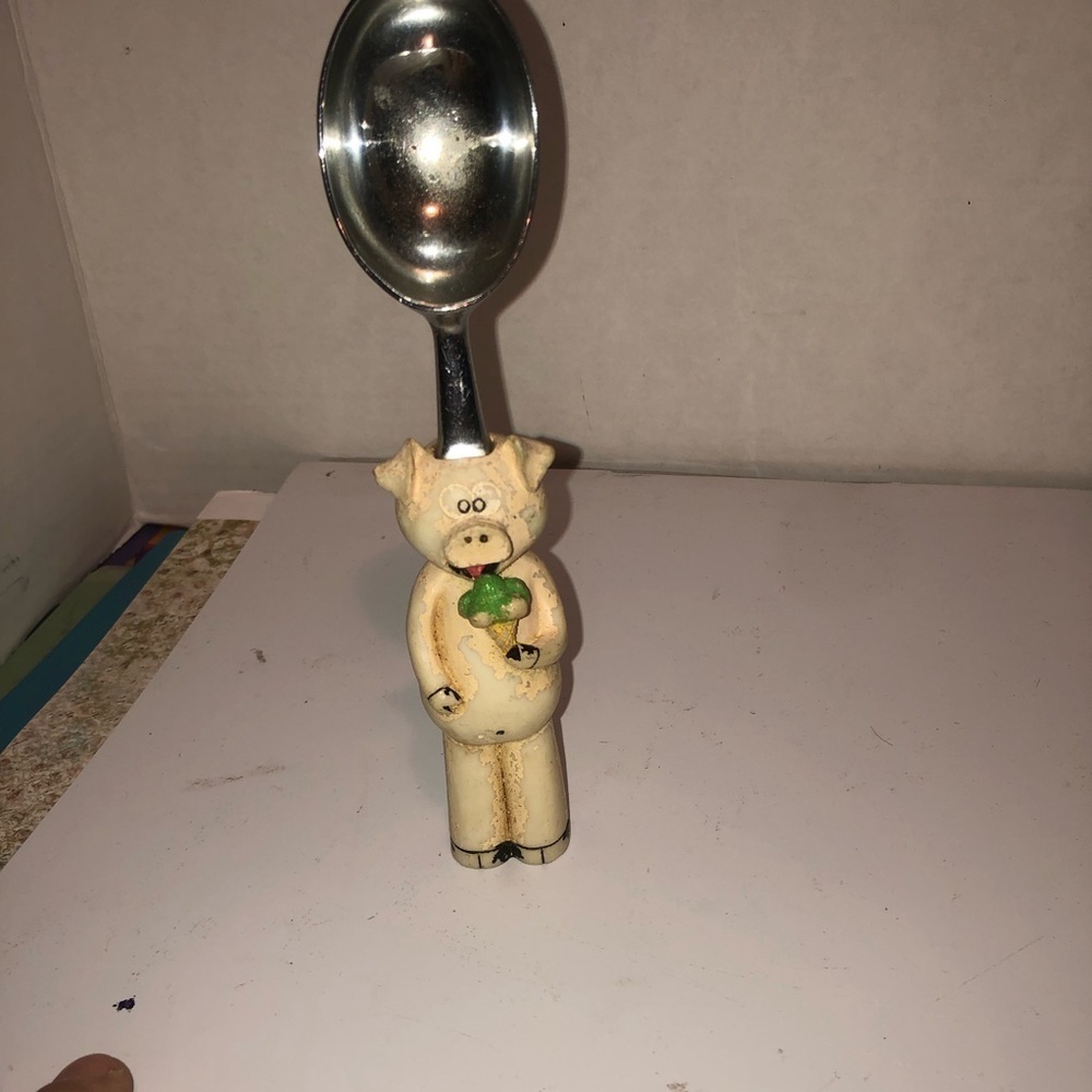 Vintage well loved piggy ice cream scoop for the pig collector.